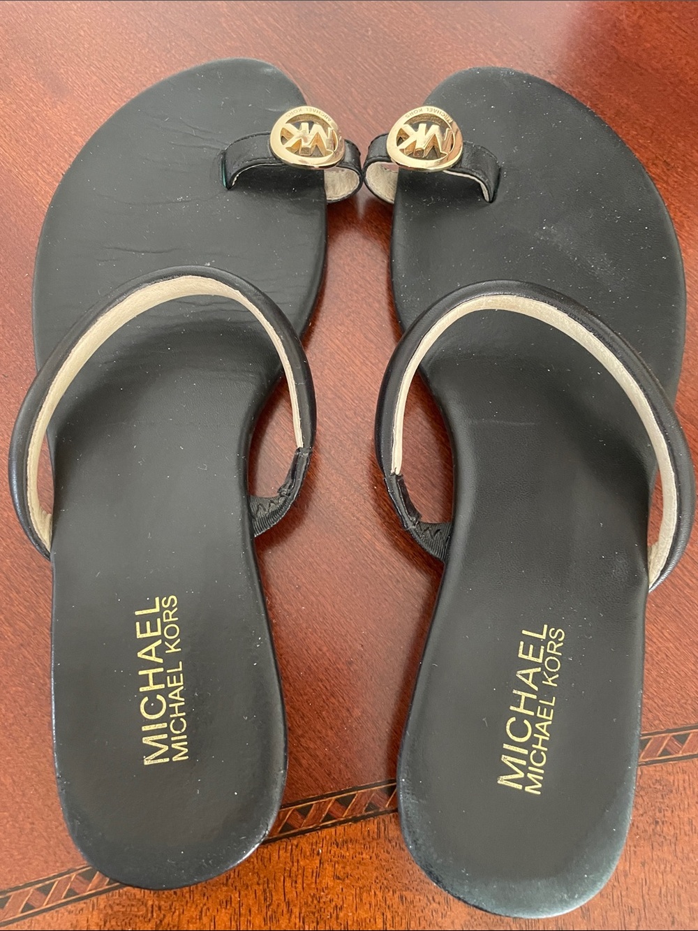 MICHAEL Michael Kors Black Sandal with Gold Logo Accent